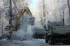 Contractors work to move ice in the Willow Creek area. Anthony Jones/Frontiersman