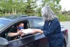 At Alaska VA Healthcare, volunteers served delicious pre-packaged meals to Veterans at the first Veteran Appreciation Curbside BBQ event. Courtesy photo