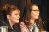 Sarah Palin speaks and Mary Peltola listens at a March 12 forum of candidates for the U.S. House seat left vacant by the death of Don Young. Al Gross' decision to end his campaign move could 