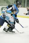 ROBERT DeBERRY/Frontiersman file The Alaska Avalanche look to
pull out of an 11-game slump tonight hosting the Kenai River Brown
Bears. Above, Jay Baldwin battles for a puck in a recent home
