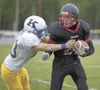 ROBERT DEBERRY/Frontiersman Houston sophomore Matthew Barron
tries to break a tackle during a loss to Kodiak. Barron is expected
to see more time at running back tonight as the Hawks host the
