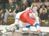 ROBERT DeBERRY/Frontiersman file photo Colony’s Charles Coisman
tries to control East Anchorage’s Matt Mainoske during the
103-pound final of the 2007 ASAA/First National Bank 4A State
Wrestl