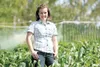 ROBERT DeBERRY/Frontiersman Rachel Kenley began her business in
2001 when she was just 11 years old. Kenley’s business model was
delivering a basket of fresh vegetables to customers’ doors ea