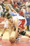 ROBERT DEBERRY/Frontiersman Wasilla senior Jessica Carter goes
for a loose ball during a win over Palmer late in the regular
season. Carter is a key part to Wasilla’s inside attack, which may