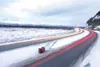 ROBERT DeBERRY/Frontiersman An overturned vehicle lays in the
median along the Glenn Highway Monday as traffic speeds by. Local
police and the Alaska State Troopers urge holiday drivers to sl