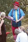 Marky d Clown and Zookeeni the Great, entertained children with
their balloon creations at the Happy Trails Party held in Nunley
Park, Tuesday. Photo by MICHAEL WHITE/Frontiersman.
