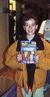 12-year-old Greg Washam brought a Bob the Builder toy to Mat-Su
Cinema Saturday so he could watch "Monsters, Inc." for a second
time. Photo by Eowyn LeMay Ivey/Frontiersman.
