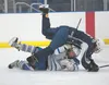 Soldotna’s Stephen Endsley and Palmer’s Luke Wright collide on the ice during Saturday’s game at the MTA Events Center in Palmer. ROBERT DeBERRY/Frontiersman.com