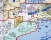 Twelve borough assembly districts are, as a result of the recent
round of redistricting, split across precinct lines. Although this
is 11 more splits than resulted during the 1990 round of
re