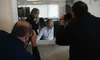 Gail Fenumiai, director of the Alaska Division of Elections, laughs with Brian Jackson, election program manager, on Wednesday, Aug. 31, 2022 at division headquarters in Juneau as they prepar