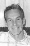 DOYLE G. McELHANEY