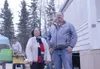 Joan Pollock of Wasilla stands with Curt Christiansen in front
of her mobile home which was weatherized last week as part of a
class offered by Alaska Housing Finance Corp. (Heather A.
Resz/F