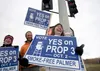 Becky Stoppa, Tobacco Prevention and Control coordinator for Alaska Family Services, along with other proponents of Prop 3 hold signs at the corner of The Palmer-Wasilla and Glenn highway Tue