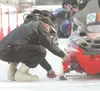 ROBERT DeBERRY/Frontiersman Ice Racing Alaska semi-pro racer
Jefferson Lee Davis checks the width of his ski stance before the
start of Saturday’s races on Lake Lucille.
