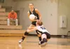 Laura Maresh and Allison Leigh collide as Maresh dives for the
ball. ROBERT DeBERRY/Frontiersman