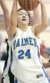 ROBERT DeBERRY/Frontiersman Palmer forward Amy Tzou grabs the
rebound during Thursday's game against the Houston Hawks at the
Palmer Elks Showdown Basketball Tournament.