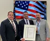 Deren Bennett was recently installed as Postmaster of Wasilla in a special installation ceremony. (Left to Right, Alaska District Manager Tim Bruno, Bennett, Manager Post Office Operations Bi