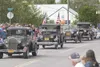 A line of Model A Fords move along the 2011 Independence Day
parade route in Wasilla. The Model A group took first place in the
vehicle category. (ROBERT DeBERRY/Frontiersman)