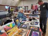 June Pardue sells handcrafted fish skin clothing and other items inside the Palmer Depot during the first Alaska Native Marketplace. Jacob Mann/Frontiersman