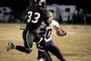 (ROBERT DeBERRY/Frontiersman) Colony Knight defensive back Tony
Taranto takes hold of Bartlett Golden Bear Jordan Blount-O'Connor
during Friday's game at Colony High School.