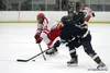 Wasilla senior captain Luke Schruf reaches for the puck during a win over Homer in the North Star Conference semifinals last week. Schruf was named the North Star Conference Most Valuable Pla