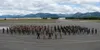 Participants of RED FLAG-Alaska stand together for a group on the flight line at Joint Base Elmendorf-Richardson, Alaska, on June 25, 2021 after completing the exercise. Approximately 1,500 s