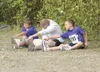 ROBERT DeBERRY/Frontiersman From left, John Erickson III, 11,
dad John Erickson Jr. and brother Malachi Erickson, 9, stretch
before the start of the 6th annual Curtis C. Menard Memorial Run
S