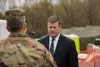 Army Secretary Ryan D. McCarthy speaks with Maryland Adjutant General Maj. Gen. Timothy Gowen while visiting a COVID-19 screening site in Landover, Md., in this file photo from March 31, 2020
