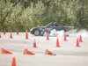 ROBERT DeBERRY/Frontiersman Racer and instructor Howard Bone
smokes his Maza Miada tires as he negotiates a 180 degree turn
during his run on Saturday. This is the Alaska ASCCA's fifth event
