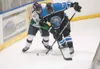 Alaska Avalanche forward Gage Christianson battles for control of the puck against Wenatchee Wild defenseman Michael Lant during a October game at the MTA Events Center in Palmer. Wenatchee s