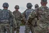 Sgt. Maj. of the Army Michael A. Grinston provides feedback to Soldiers during an exercise walkthrough for the Army-level Best Warrior Competition at Fort Knox, Ky., Sept. 22, 2021. Grinston 
