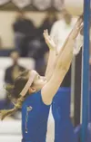 Palmer setter Jenna Arlow reaches to the net last season. Arlow
returns as one of Palmer’s two team captains. The Moose play at
South Anchorage on Saturday. File photo
