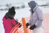 Cathi Kramer and daughter Megan help setup for Winterfest 2014.  Cehckout the schedule of events for Winterfest 2015 online at biglakewinterfest.com. HEATHER A. RESZ/Frontiersman.com