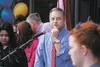 Gov. Sean Parnell scans the crowd for dignitaries to recognize during Tuesday’s signing ceremony for this year’s education bill. Parnell touted the bill as providing more opportunities for st