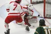 Wasilla's Austen Park and goalie Kiana Verplancke try to keep the puck from crossing the goal line during a 5-3 loss to Colony Feb. 7. Courtesy of Bruce Eggleston/mats