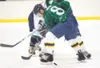 ROBERT DeBERRY/Frontiersman Alaska Avalanche forward Zach Smith
tries to get control of the puck during the Avalanche’s game
against the Alexandria Blizzard Friday at the Curtis C. Menard II
