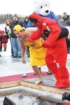 Jumpers prepare to launch into icy Wasilla Lake during the 2014 Mat-Su Polar Plunge. Entries and donations are being accepted for the 2015 plunge now. HEATHER A. RESZ/Frontiersman