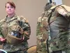 Lt. Col. Ginger Whitehead, product manager for Soldier protection equipment at Program Executive Office Soldier, points to the maxillofacial protection on the new Integrated Head Protection S