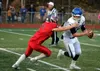 Palmer senior quarterback Luke Guggenmos eludes the pressure during a win over Wasilla in the Potato Bowl. Courtesy of Bruce Eggleston/matsusports.net