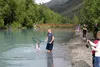 An angler nets a catch at the Eklutna Tailrace. Jacob Mann/Frontiersman