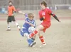 Wasilla’s Adam Friese battles for possession with a Palmer
defender during a game earlier this year. Friese was a captain of
Wasilla’s hockey and soccer teams, along with being named the
Wasi