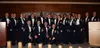 U.S. Air Force chief master sergeants selectees pose for a photo at a ceremony at the Arctic Warrior Events Center on Joint Base Elmendorf-Richardson, Feb. 9, 2024. Chief master sergeants hol