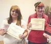 ROBERT DeBERRY/Frontiersman Houston High School’s Kylie Boepple
and Wasilla High School’s Rachel Clark were recognized by the
Mat-Su Valley Frontiersman for their outstanding work on the
2010