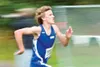 ROBERT DeBERRY/Frontiersman Palmer junior Mason Minturn races
down the finish chute during the Colony Invitational Saturday
afternoon at Colony High School. Minturn finished fifth in the
boys