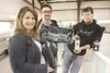 ROBERT DeBERRY/Frontiersman Two of Glacier Creek'€™s co-owners,
Scotti MacDonald, left, and Toby Foster, center, along with
distiller Theo Graber, stand inside their new facility off the
Palm