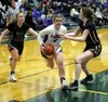 Palmer's Maija Huckabay drives between a pair of defenders. Bruce Eggleston/matsusports.net