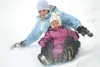 ROBERT DeBERRY/Frontiersman Dawson Werner, 14, attempts to
control the sled as she flys down the hill with sister Brittyn at
Crevasse Moraine Trail System.
