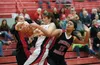 Wasilla’s Catherine Baham fights for posession against a pair of Juneau-Douglas Crimson Bears during the Doc Larson’s Roundball Classic Jan. 2-4 at Wasilla High School. Robert DeBerry/Frontie