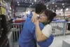 Cassie Nix hugs Anthony Keller after meeting for the first time
since Keller used CPR to revive Nix’s 5-year-old daughter Taylia
Hardy. (ROBERT DeBERRY/Frontiersman) Robert DeBerry