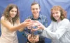 ROBERT DeBERRY/Frontiersman From left, Marija Spaic, Caleb Hein
and Alison Bilafer want to help the homeless. The trio of local
home-schoolers are organizing a coin drive to raise transportat